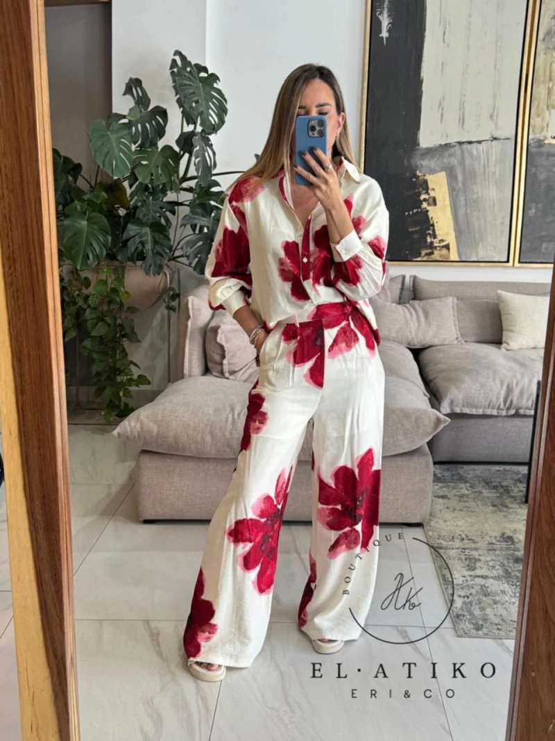 Pantalon estampado flores rojas
